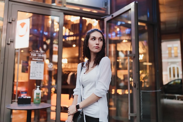 Female portrait in a neon city high quality photo