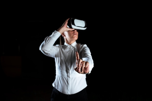 Female Professional Wearing Virtual Reality Headset Gesturing And Enjoying Simulator Elegant Businesswoman Presenting Modern Technology And Using Futuristic Gadget