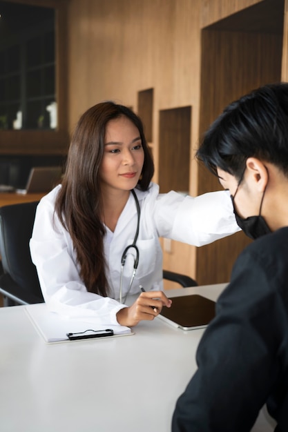 Female psychologist comforting her depressed patient with sympathy.