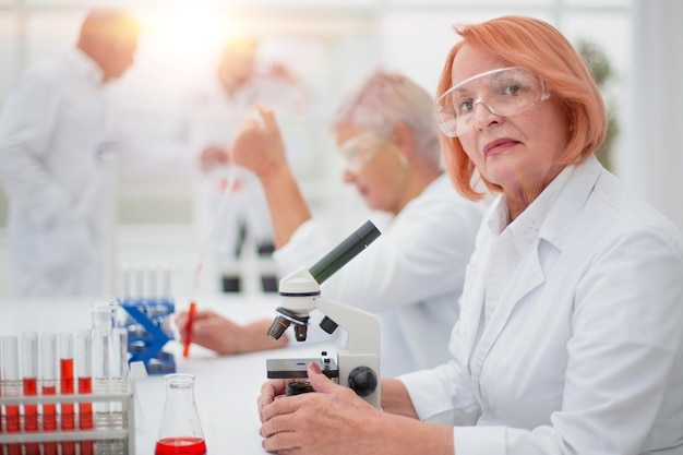 Female scientist conducts a blood test in the laboratory