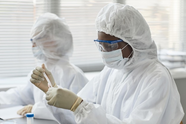 Female Scientist Experimenting in Laboratory