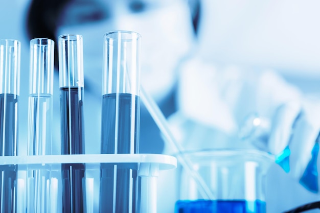 Female scientist holding medical sample at laboratory