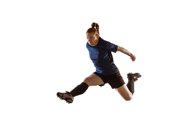 Female soccer, football player kicking ball, training in action and motion