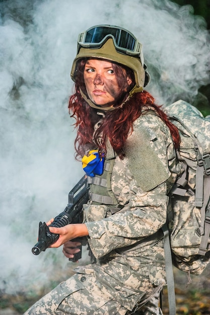 Female soldier in the forest