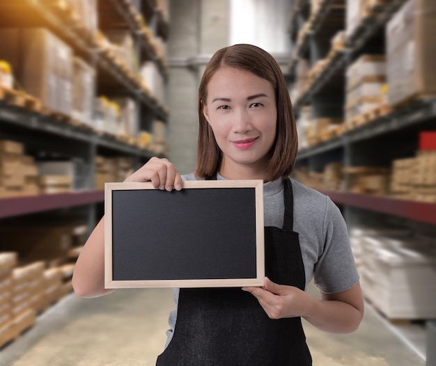 Female staff Holding chalkboard