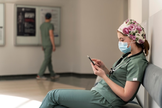 Female student at medicine wearing medical mask