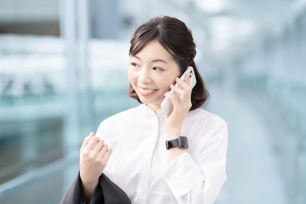 Female talking on smart phone with smile