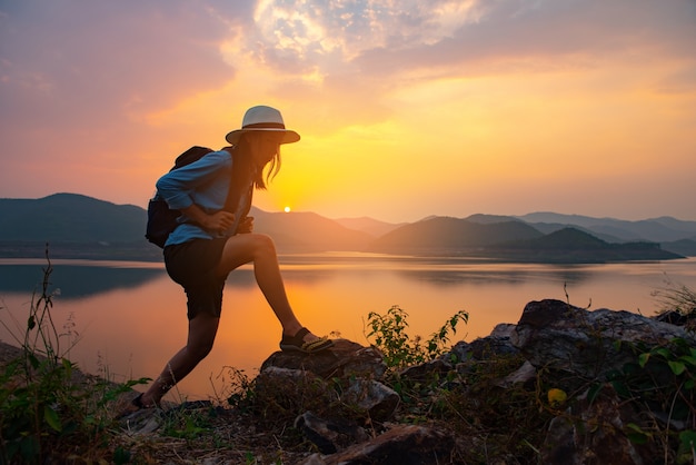 Female tourists walking on rocks