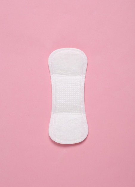 Feminine hygiene concept Menstrual woman pads for hygiene protection in critical days on pink pastel background