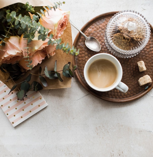 Feminine tabletop home office with flowers