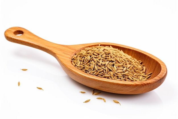 Photo fennel cumin caraway seeds in a wooden spoon isolated on white background