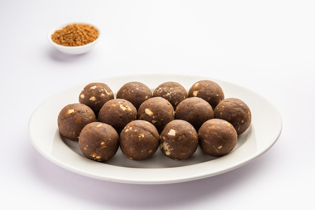 Fenugreek or methi ke Laddu laddo or laddoo or sweet mithai balls for boosting immunity in winters