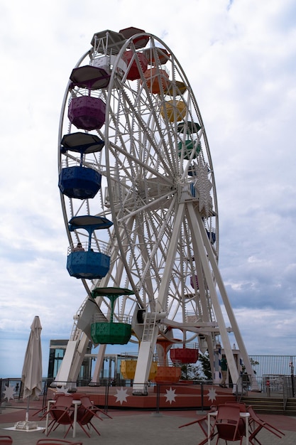 Ferris Wheel in the Barcelona at the mountain - colorful,