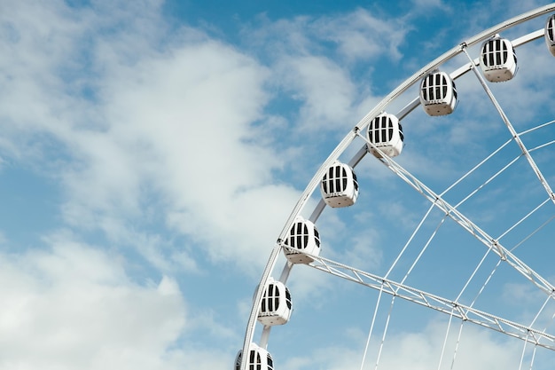 Ferris wheel in the blue sky Tourism Attractions Summer