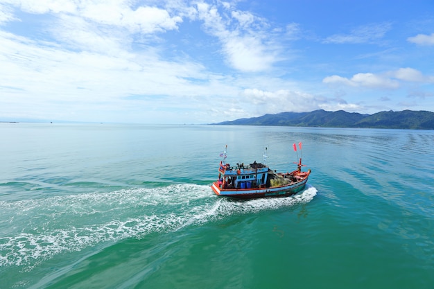 Ferry Carry car vehicles acroos Thai Bay to Koh Chang Island in beautiful sunshine day