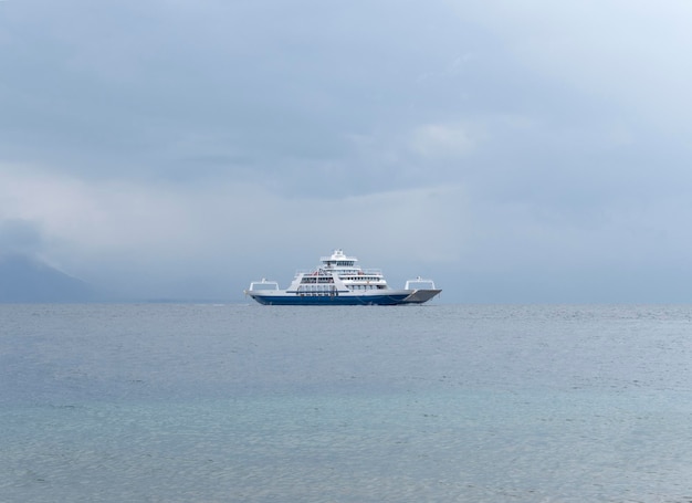 Ferryboat on island Evia (Euboea), Greece on a cloudy day in Aegean Sea