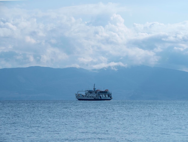 Ferryboat on island Evia (Euboea), Greece on a cloudy day in Aegean Sea