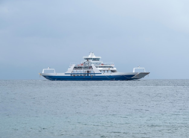 Ferryboat on island Evia (Euboea), Greece on a cloudy day in Aegean Sea