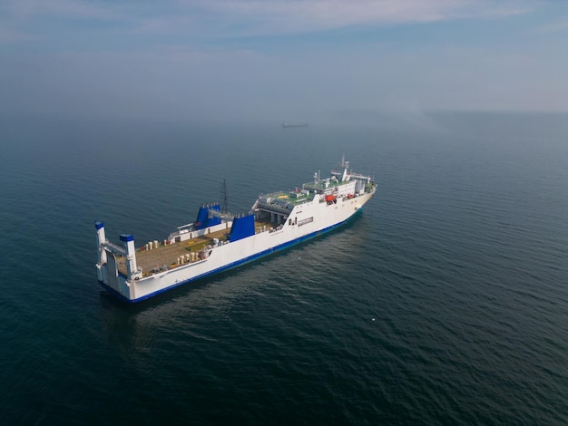 Ferryboat in the sea aerial view This vantage point can offer a unique and expansive view of the ferryboat and its surroundings potentially showcasing the scale of the vessel and its journey