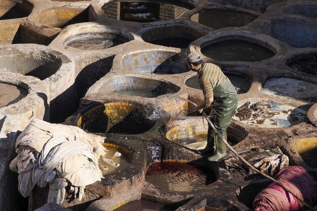 Fes, Morocco, Tannery aerial view Africa Old tanks of the Fez's tanneries with color paint for leather