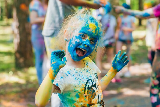 Festival of colors Holi. Happy joyful children