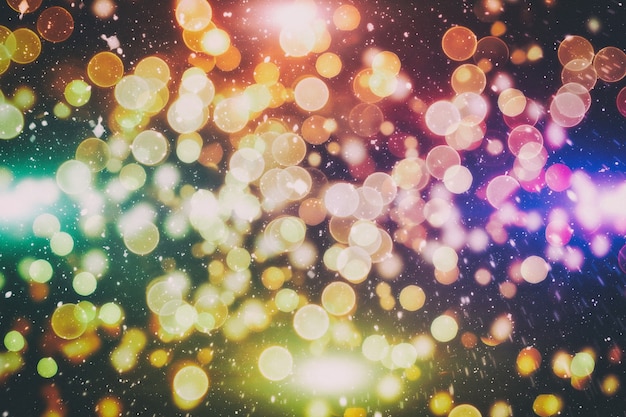 Festive background with natural bokeh and bright golden lights. Vintage Magic background with colorful bokeh.