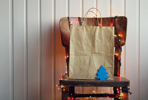 Festive background with a paper bag New Year Christmas