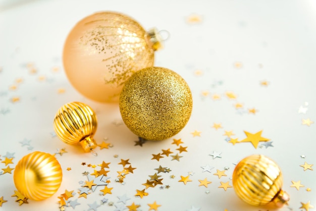 Festive christmas balls composition golden color