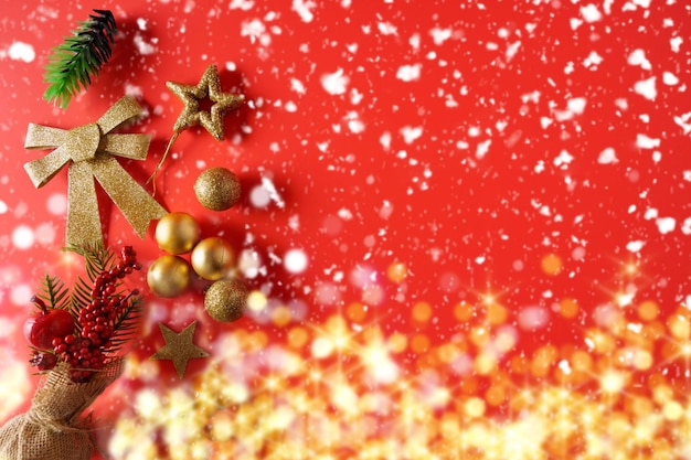 Festive Christmas ornaments and decorations on red background