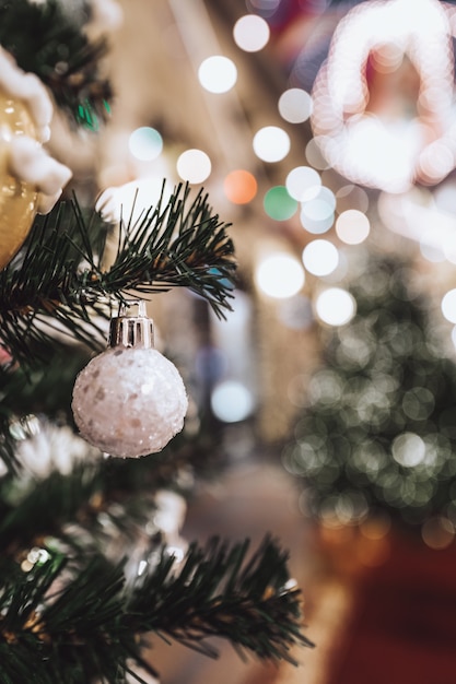 Festive Christmas tree decorated with Christmas toy silver ball Winter holiday celebration