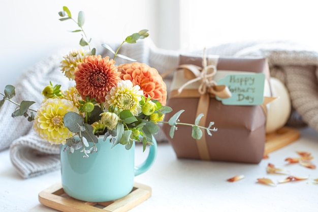 Festive composition for mothers day with gift box and flowers