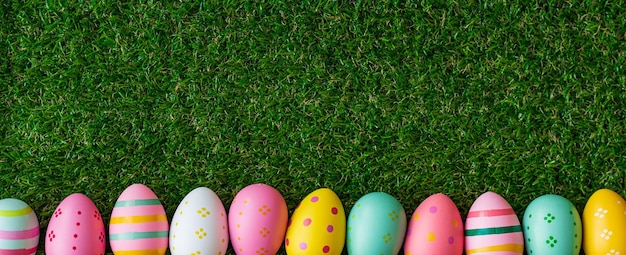 Festive Easter Banner Colorful Hand Painted Eggs In Row On Fresh Green Grass Pink Yellow Blue Long Horizontal Banner