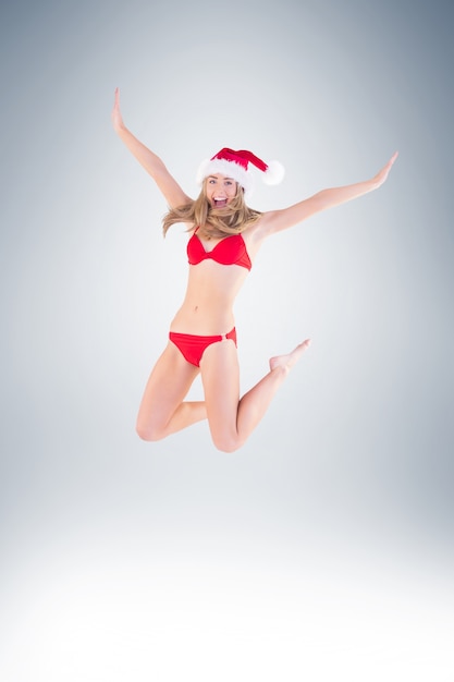 Festive fit blonde in red bikini