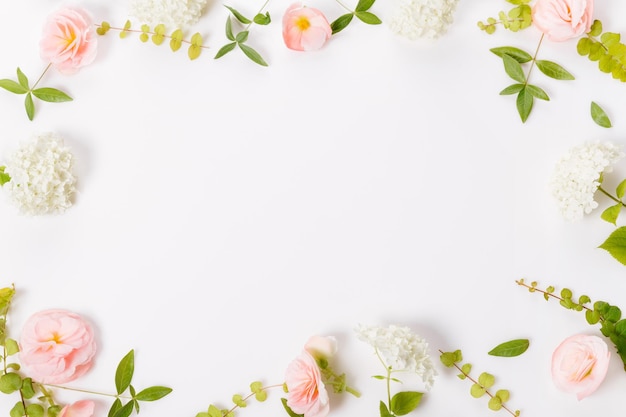 Festive flower composition on white background. Overhead view