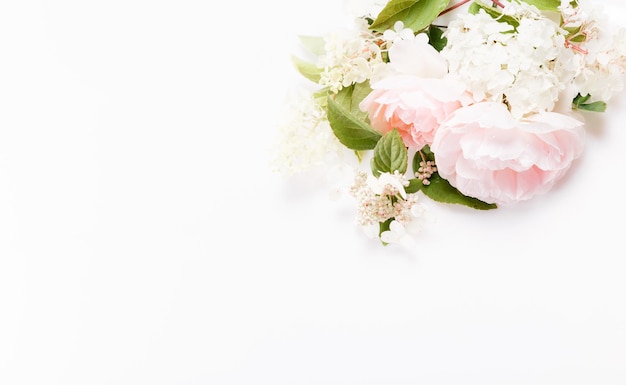 Festive flower composition on the white background Overhead view