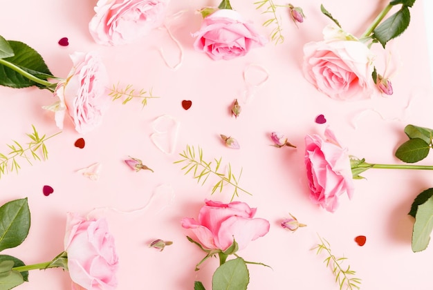 Festive flower composition on the white wooden background Overhead view