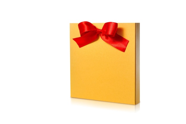 Festive gold box with a red bow on a white background