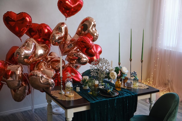 Festive table setting in dining room decorated for Valentine's Day