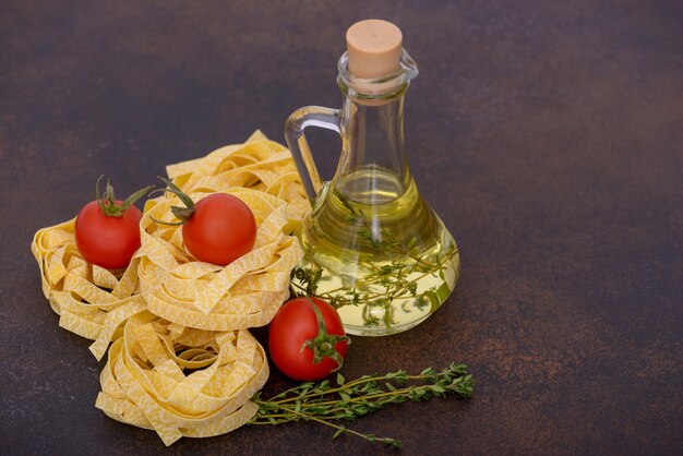 Fettuccine pasta with bottle oil and fresh tomato