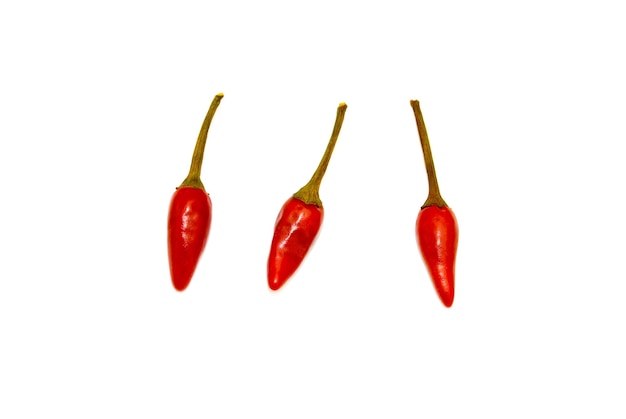 Few red chili pepper isolated on white