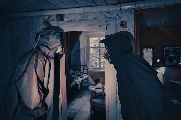 Fictional movie poster People with flashlights masks and protective clothing inspect old house Infected epidemic people in destroyed home Dark gloomy environment filter processing