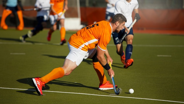 Field hockey players during a tournament game