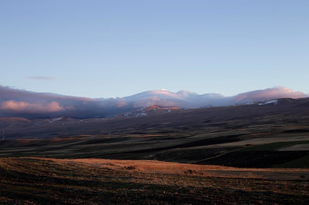 Fields and hills during sunset