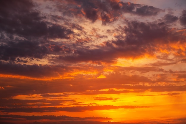 Fiery, orange and red dramatic sunset sky. Beautiful background