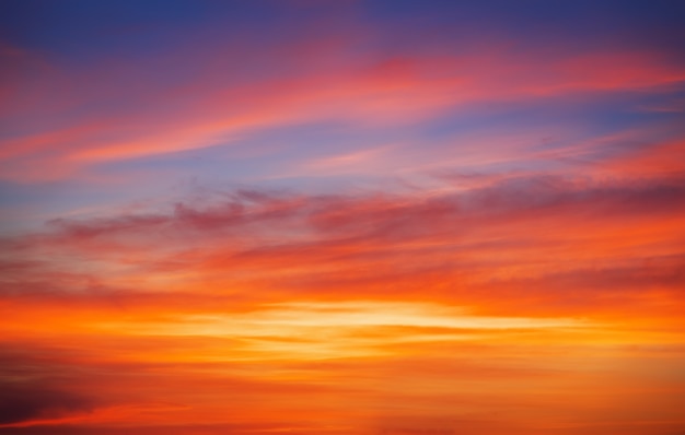 Fiery orange sunset sky. Beautiful sky background.