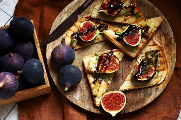 Fig toast with cheese olive oil spices and balsamic vinegar Bruschetta with figs