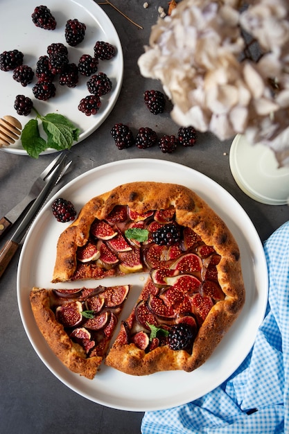 Figs galette with fresh figs. Traditional rustic fruit homemade pie, top view.