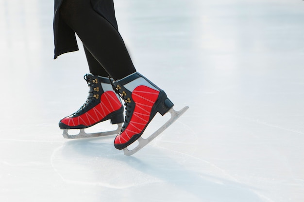 Figure skater on ice. the girl is skating. ice under the open sky