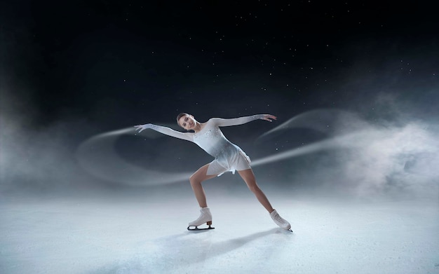 Figure skating girl in ice arena