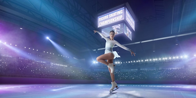 Figure skating girl in ice arena